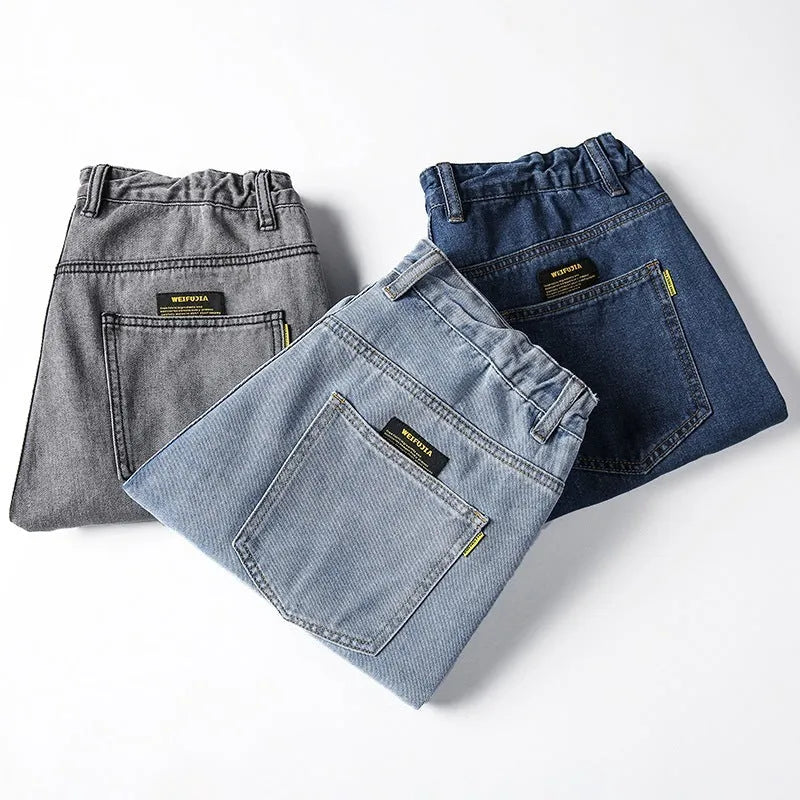 Men's loose straight jeans in dark blue cotton with zipper fly and relaxed fit