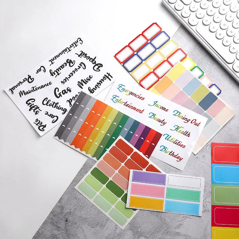 Handwritten label indicating adhesive stickers in white with multiple grid formats and colour options