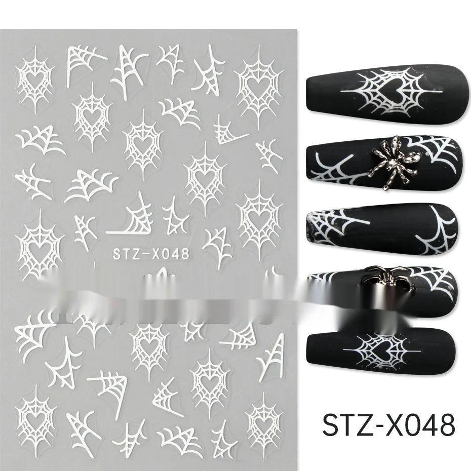 Sheet of black and silver strip nail art stickers with cartoon and love heart designs
