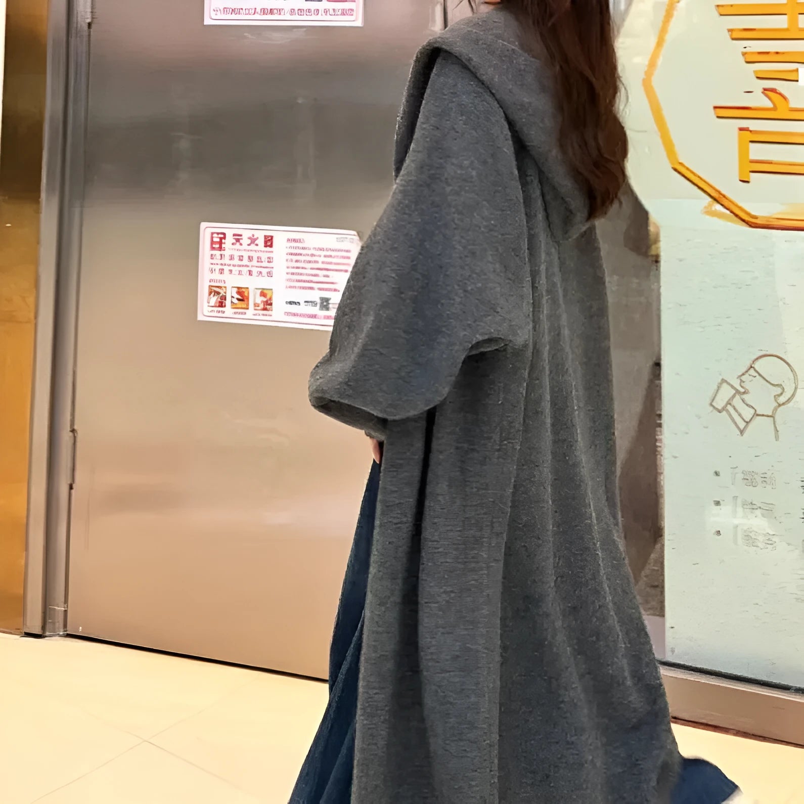 Korean style women's hooded long cardigan in below-the-knee length, loose fit