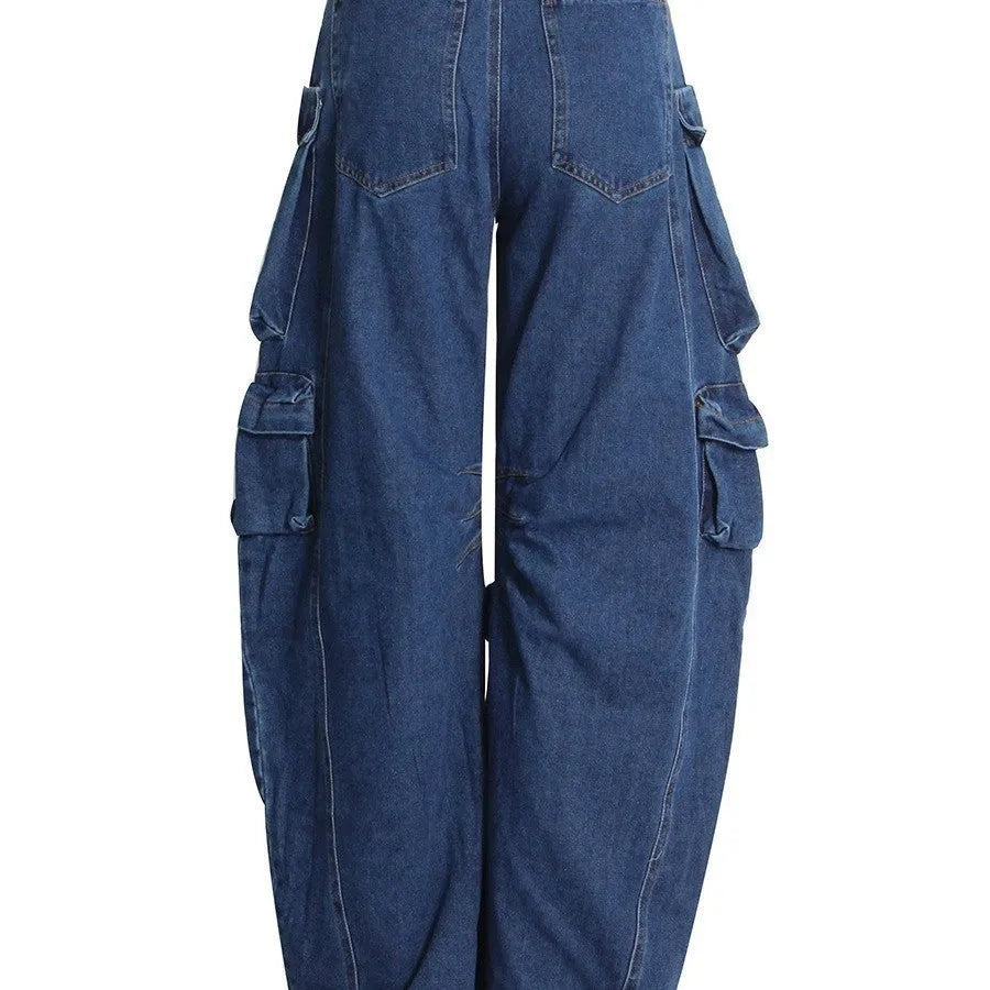 Dark blue distressed women's jeans with a high waist, wide legs, and multiple pockets on a mannequin.