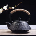 Japanese-style cast iron teapot with traditional decorative patterns and 0.9 litre capacity