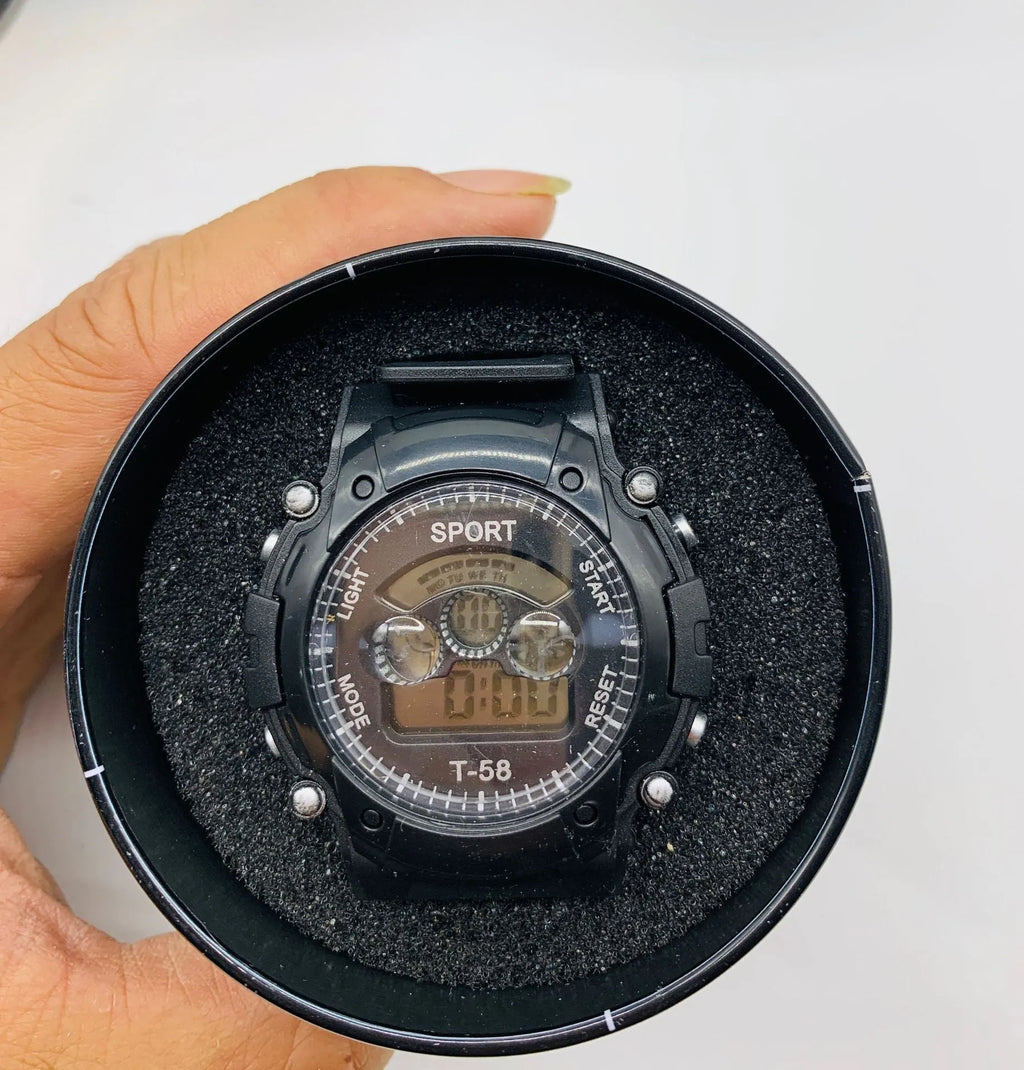 Digital sports watch for children with silicone strap, plastic case and multiple functions including alarm and lighting