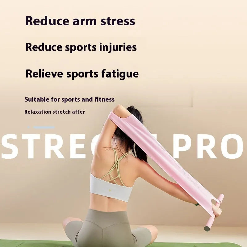 Grey and pink yoga stretching tool for shoulder and hip flexibility.