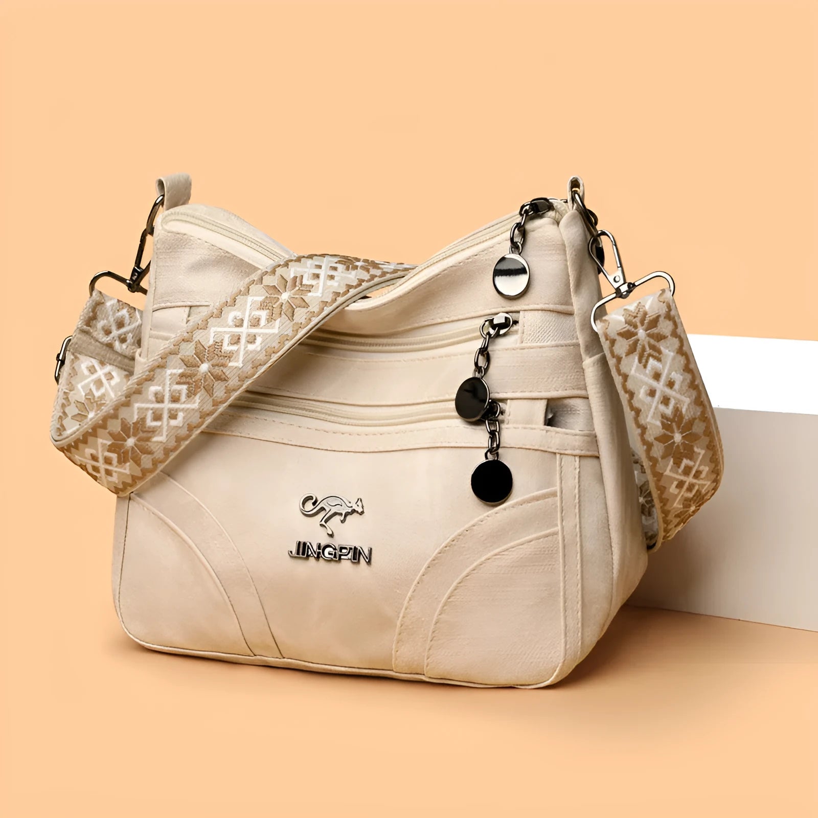 One-shoulder soft leather tote bag in brown with contrast colour details, horizontal square shape