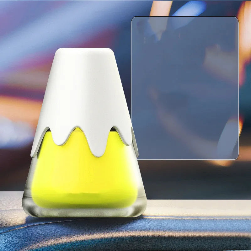 Snow Mountain Cup car air freshener in glass paste case showing four colour and scent options.
