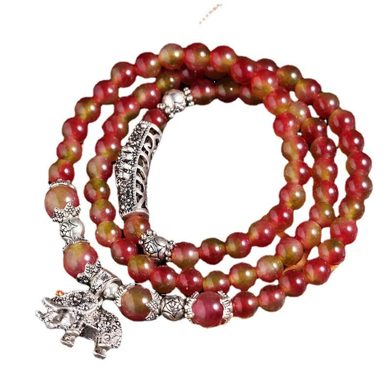 Handmade watermelon crystal bracelet with Chinese knot closure in elephant style design