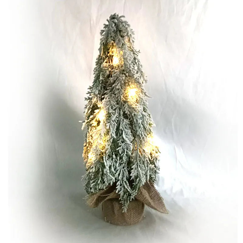 Small 24-inch white Christmas tree with lights and snow-covered branches for desktop decoration