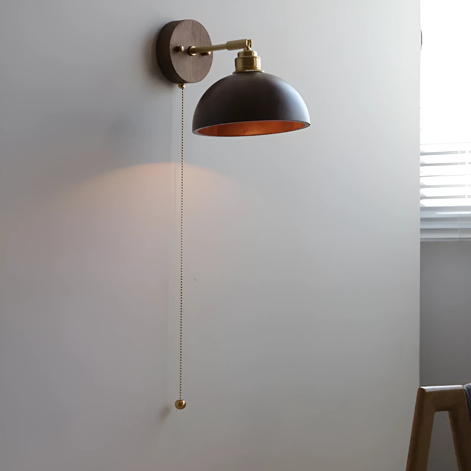 Nordic style wooden wall-mounted lamp with plug, shown in walnut colour finish.