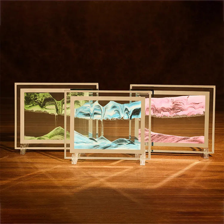 Geometric glass ornament with internal landscape quicksand painting in black, white and green colours.
