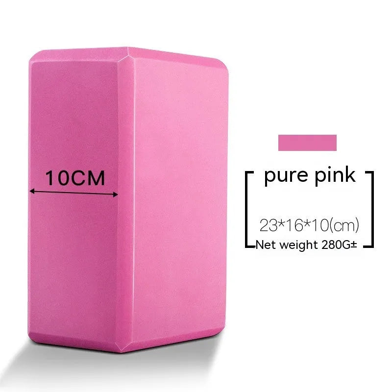 High-density EVA foam yoga block in various colours and prints on a workout mat.