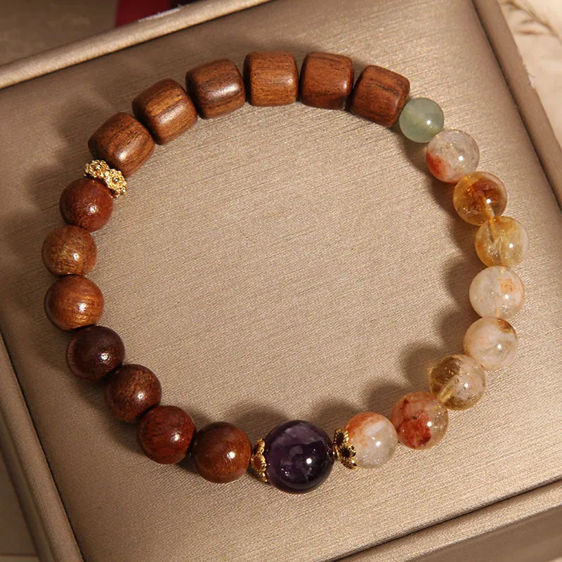 Women's bracelet with yellow tower crystal, ebony amethyst beads, pearls and rhinestones