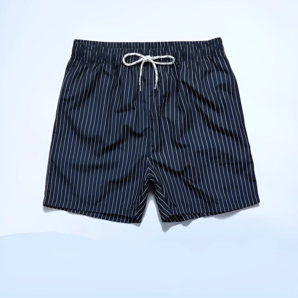 Men's striped beach shorts in navy blue, made from polyester fibre with a straight leg opening.