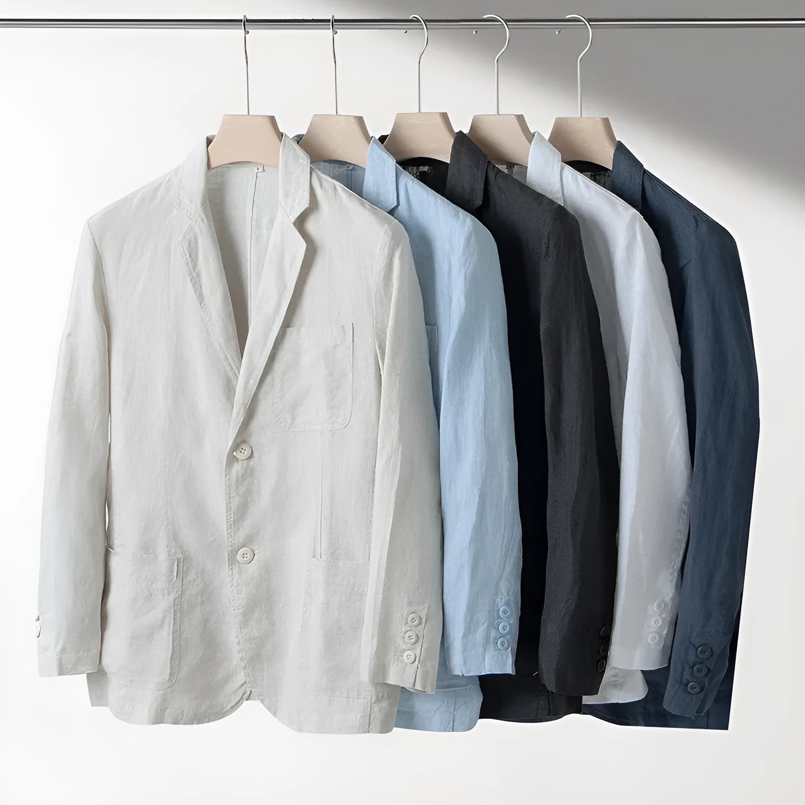 Men's loose fit linen casual suit jacket in solid colour, shown in available colours: white, black, natural linen, sky blue, navy blue.