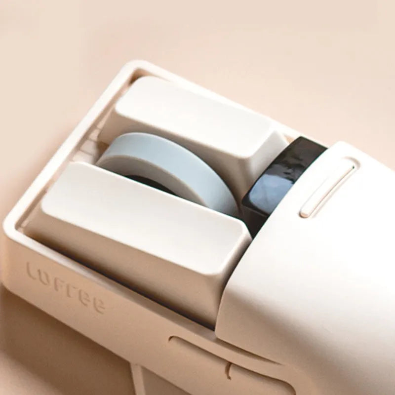 Xiaoqiao Tofu-coloured three-mode wireless mouse with USB-C cable on a desk