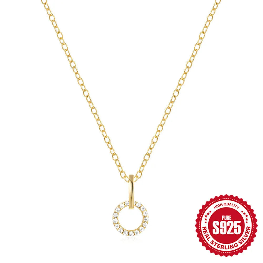 Gold-coloured S925 sterling silver adjustable clavicle chain necklace with round geometric zircon pendant.