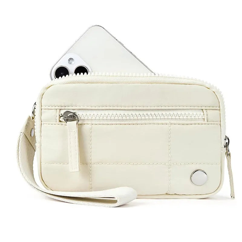 Waterproof quilted handbag with transparent deck section in nylon material