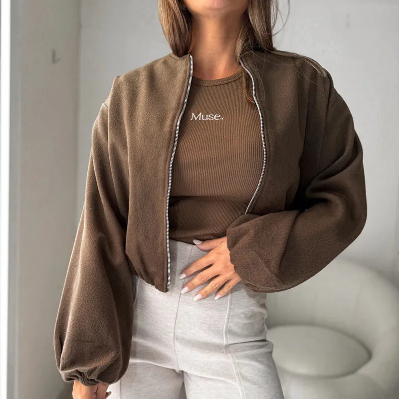 Women's off-shoulder short coat with lantern sleeves in milky white colour showing loose casual fit