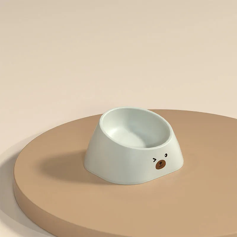 Green tilted stainless steel pet bowl with white PP base at 15-degree angle for cat or dog feeding