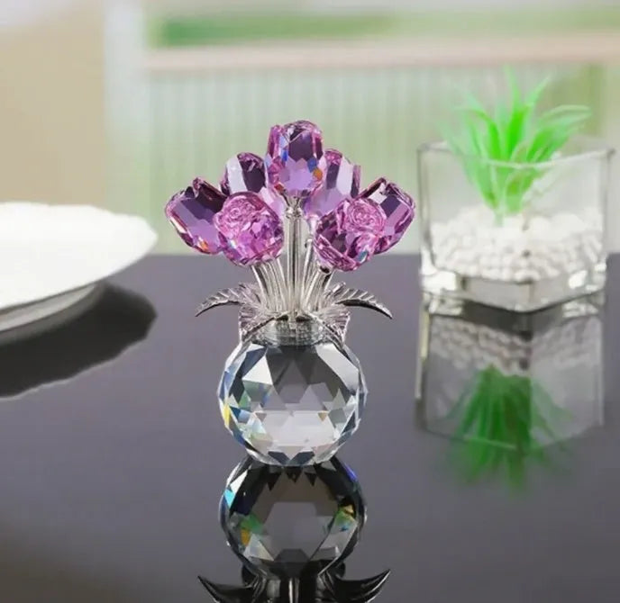 Handmade K9 crystal glass rose ornament in geometric Chinese style on a table.