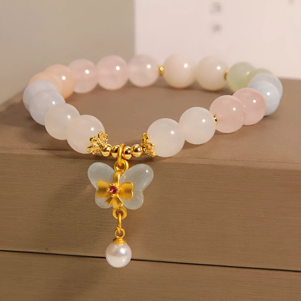 Women's crystal bracelet with colourful morganite butterfly pendant on an adjustable chain.
