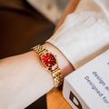 Oval mid-ancient steel watch for women with gold surface and red noodles, 7mm thin antique style dial