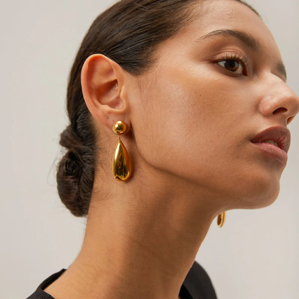 Geometric water drop stainless steel earrings with gold electroplated finish and hemisphere design details
