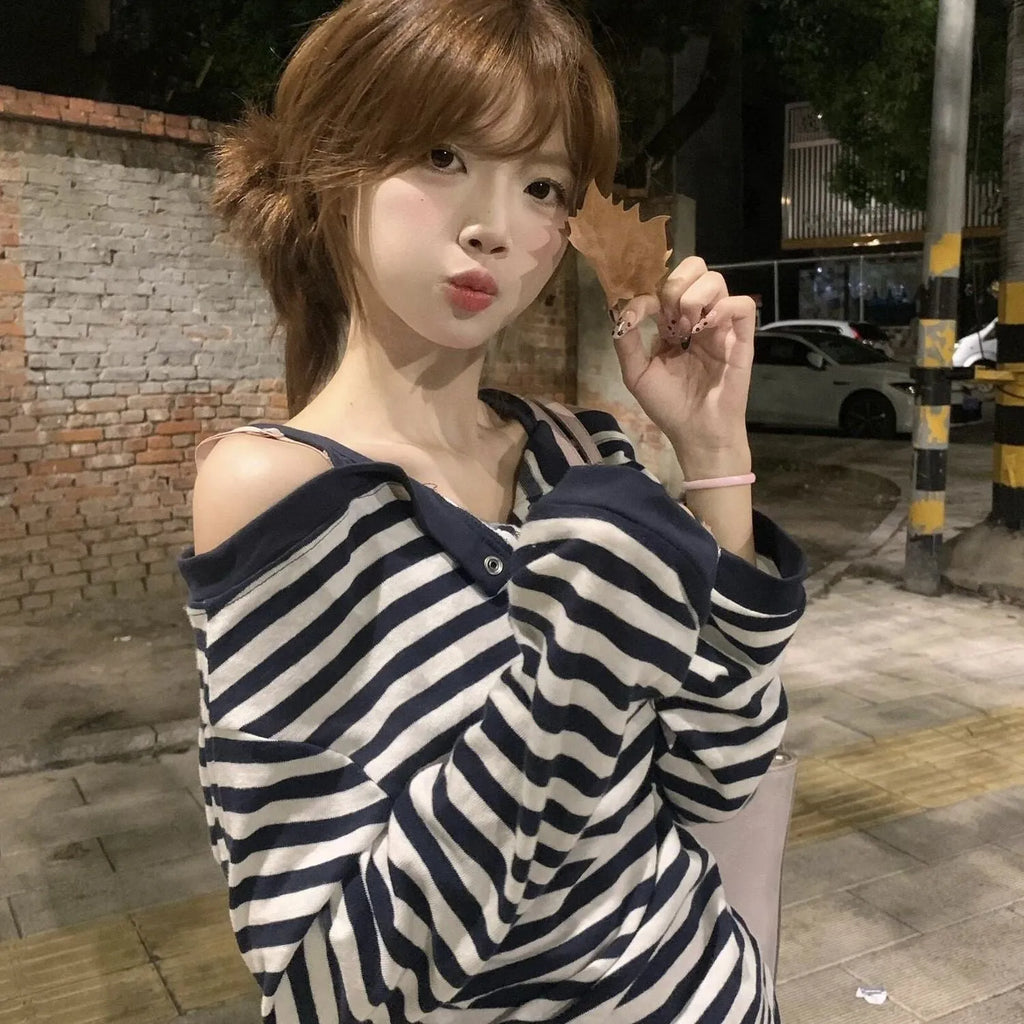 Dark blue oversized women's long sleeve t-shirt with embroidery and a striped pattern, Korean style.