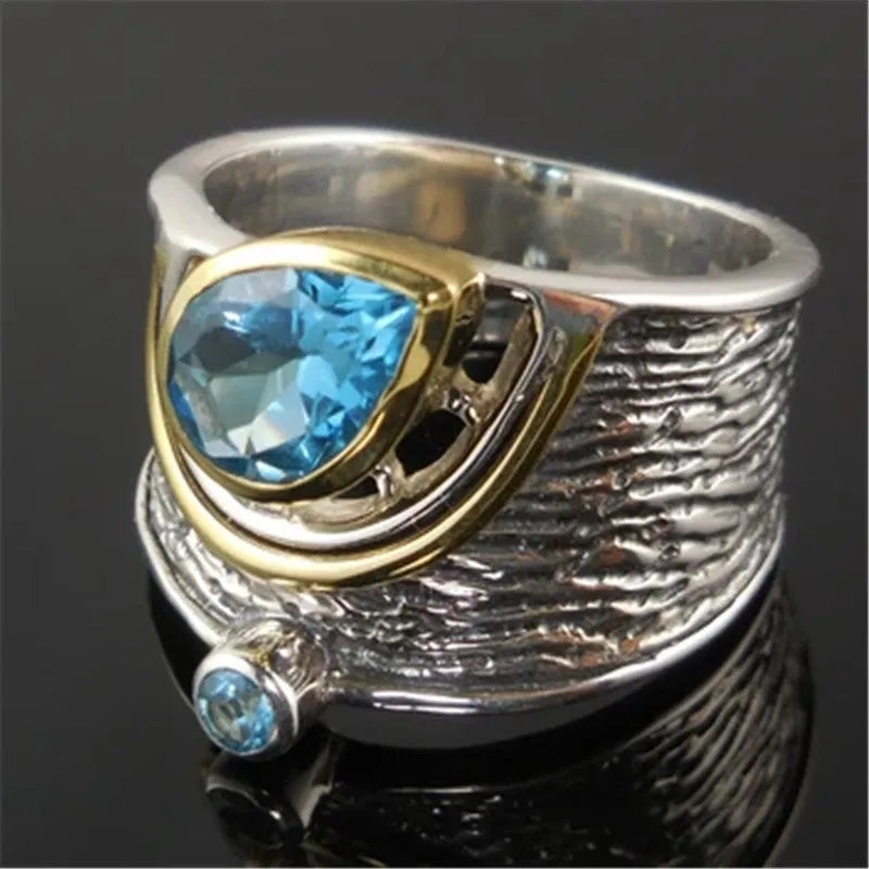 Blue zircon Chinese style women's ring with drop shape design and alloy construction