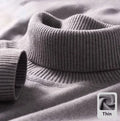 Plus size men's black knitted high-neck fleece-lined sweater on model