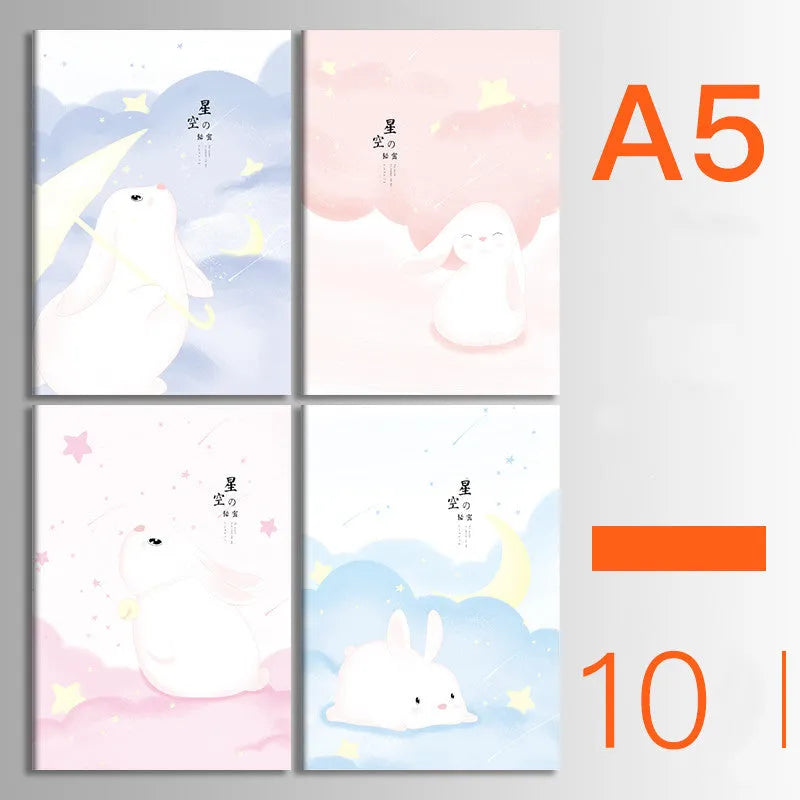 Bundle of ten soft-cover kraft paper notebooks with thread binding in various animal and nature designs.