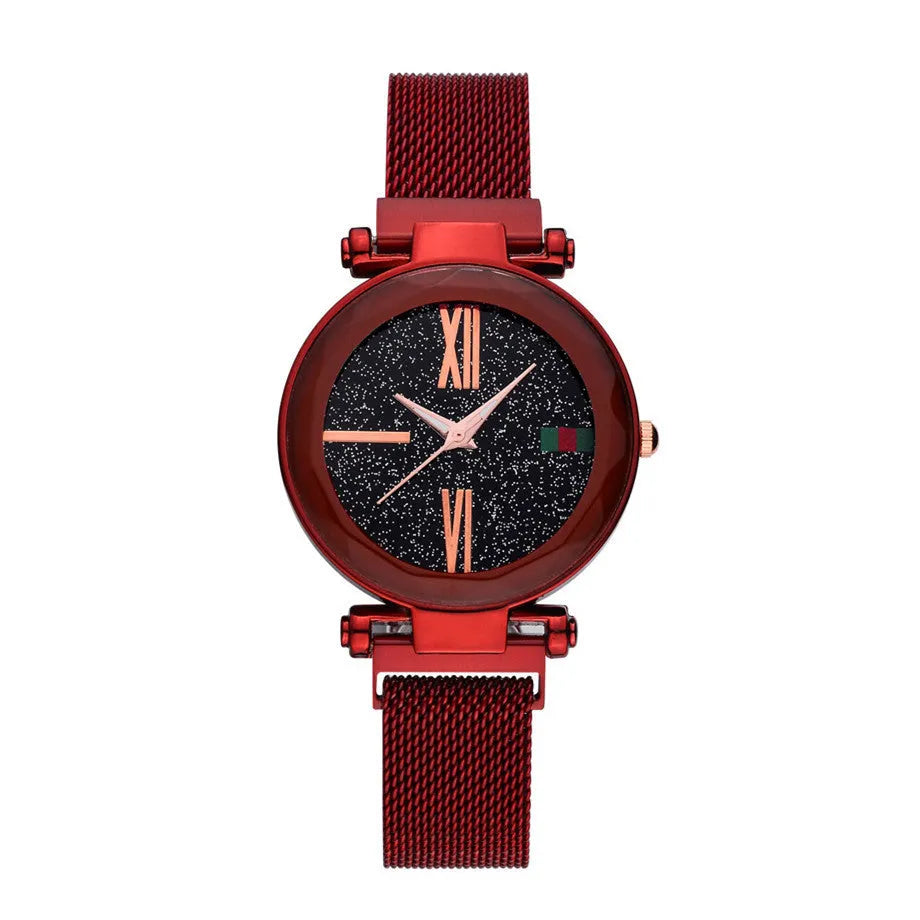 Ladies quartz wristwatch with round 32mm dial and stainless steel strap with magnetic buckle, shown in rose gold colour.