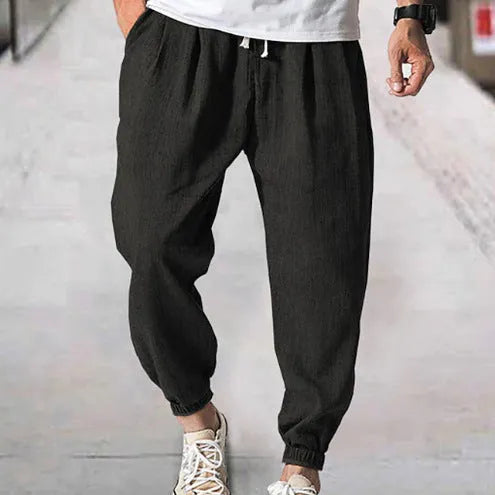 Men's casual cotton trousers in loose ankle-band fit for summer wear