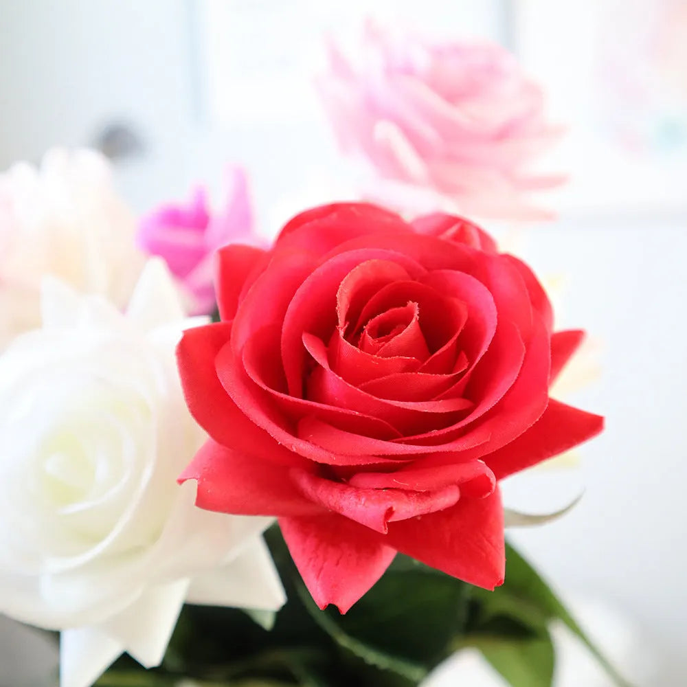 Artificial silk touch rose flower with red petals on a green plastic stem, showing approximate 42cm length.