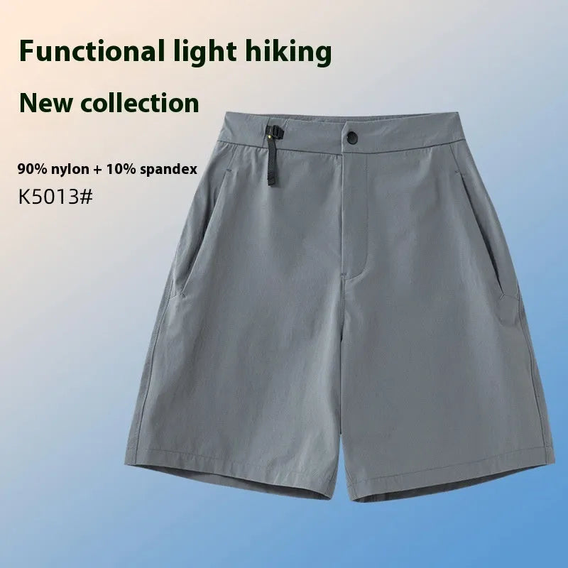 Men's solid colour quick-drying sports shorts with elastic construction, shown in khaki colour