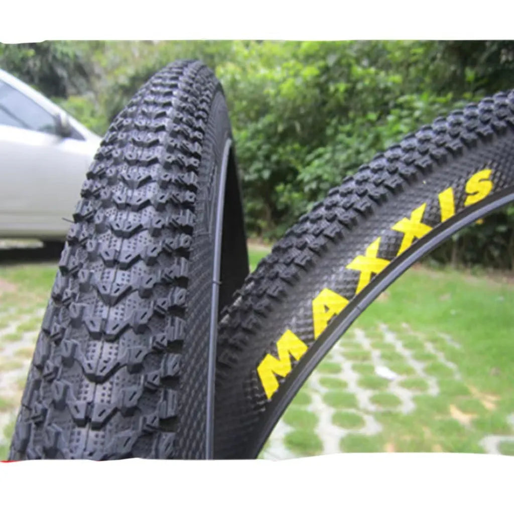 Ultralight puncture-resistant mountain bike tyre showing tread pattern and available sizes