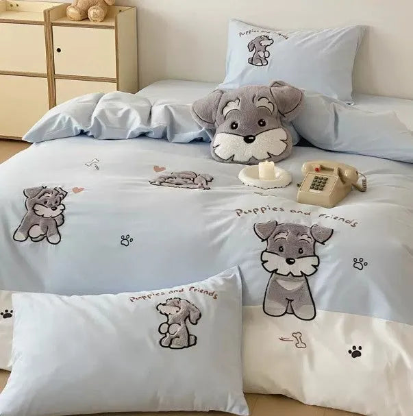 Cute Schnauzer dog cartoon pattern on a light blue thickened cotton quilt cover and matching pillowcases.