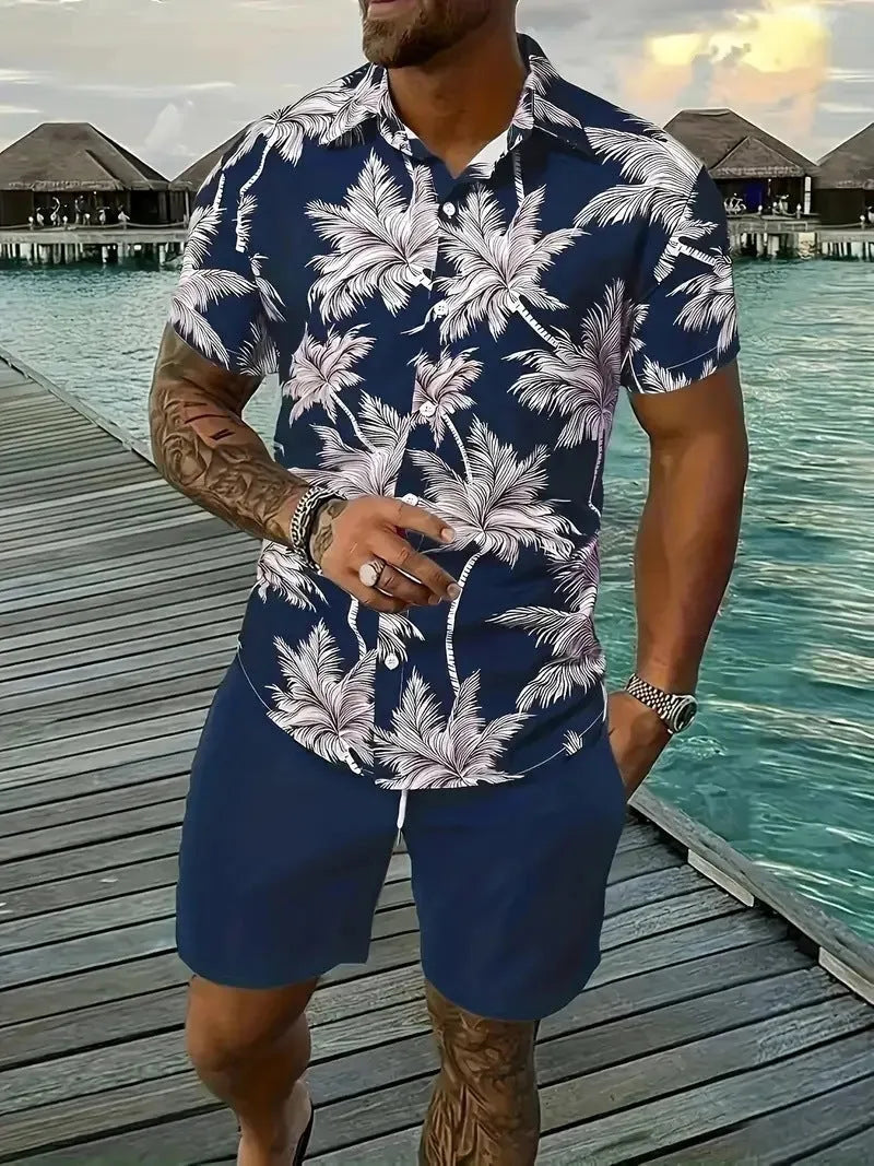 Man wearing a blue Hawaiian print short sleeve shirt and matching shorts from the casual suit set.