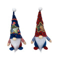 Two faceless red Rudolf baby doll ornaments with suit styling on a white background