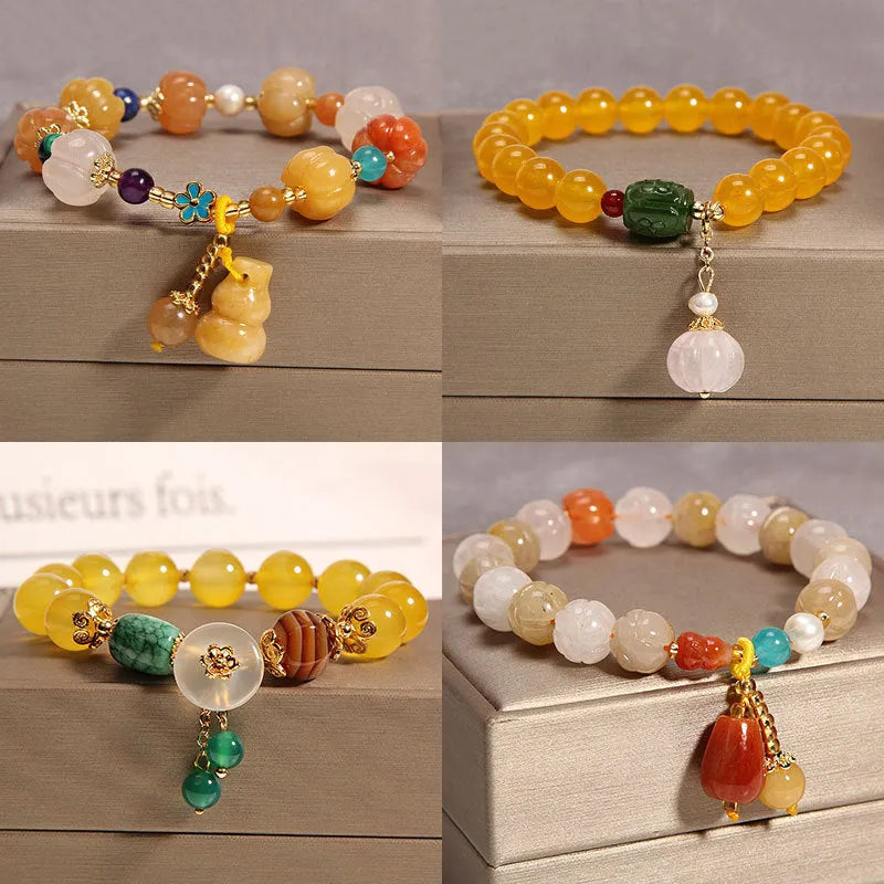 Khaki yellow agate crystal bead bracelet on an adjustable gold silk cord.