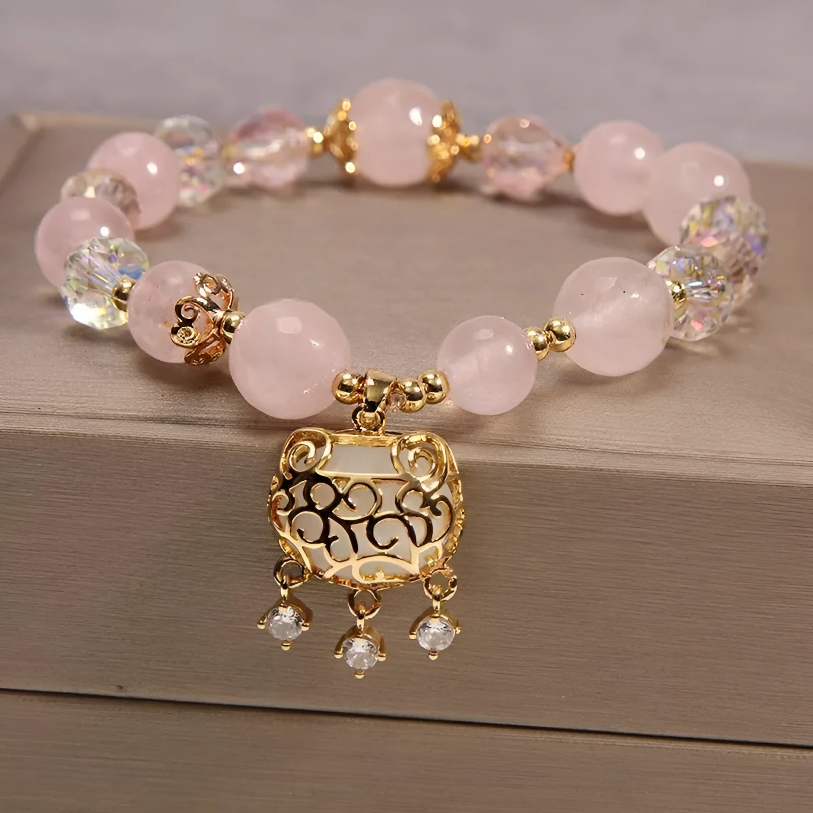 Khaki yellow agate crystal bead bracelet on an adjustable gold silk cord.