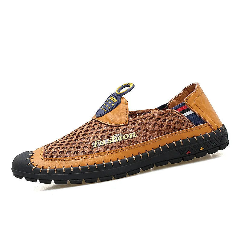 Men's brown mesh casual shoes with round toe and rubber sole on a plain background.