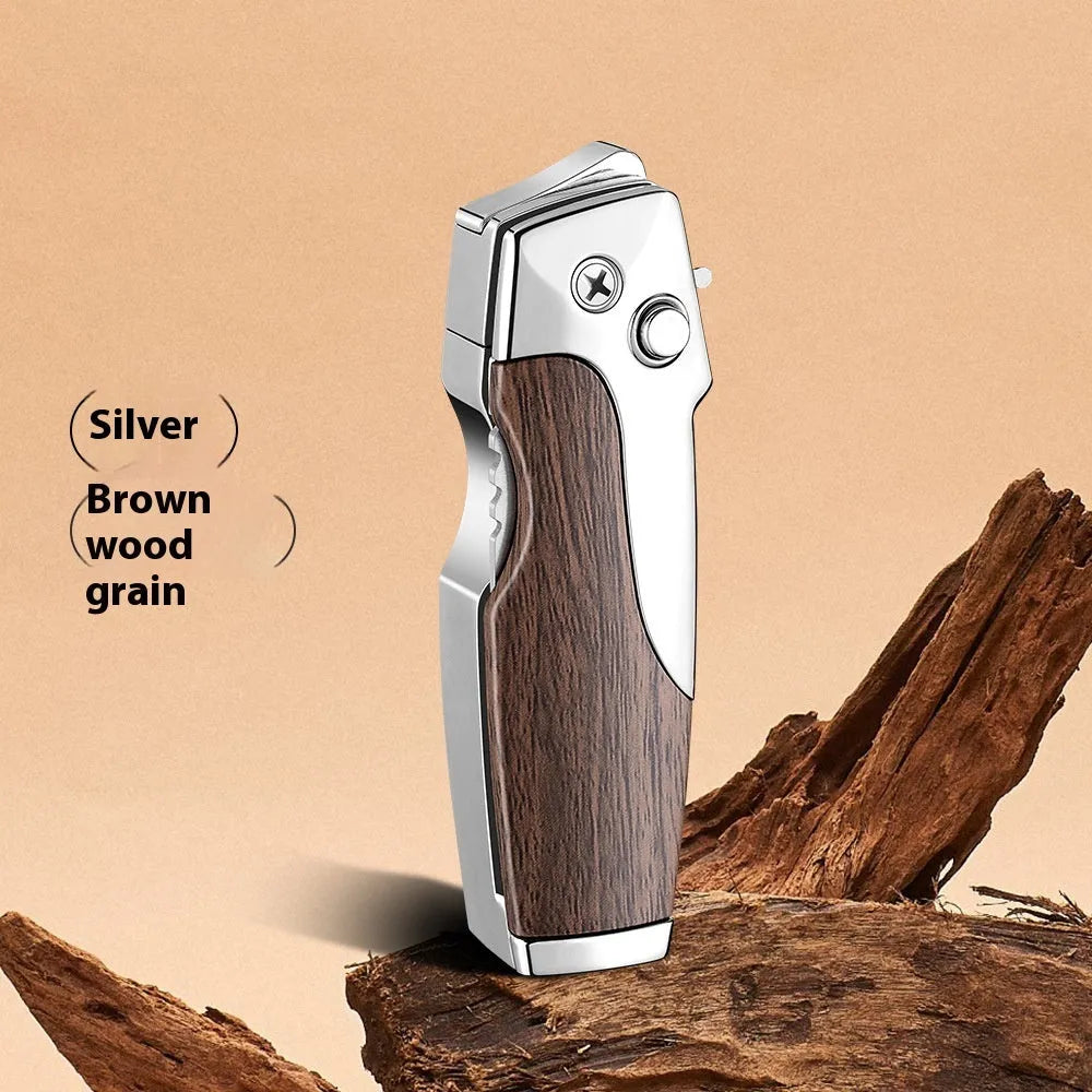 Metal folding lighter with integrated pocket knife tool in a wood grain finish.