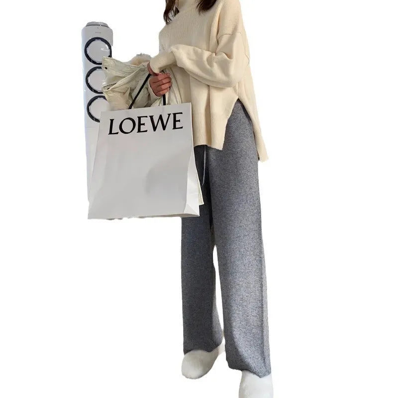 Women's knitted wide-leg high waist trousers in straight cut with drop hem design