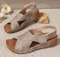Women's brown Roman platform sandals with a skirt detail and Velcro strap.