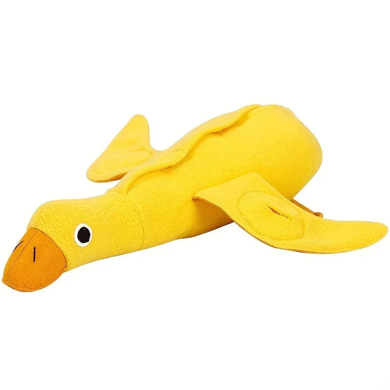 Yellow teddy bear duck plush dog toy with squeaker and treat holes.