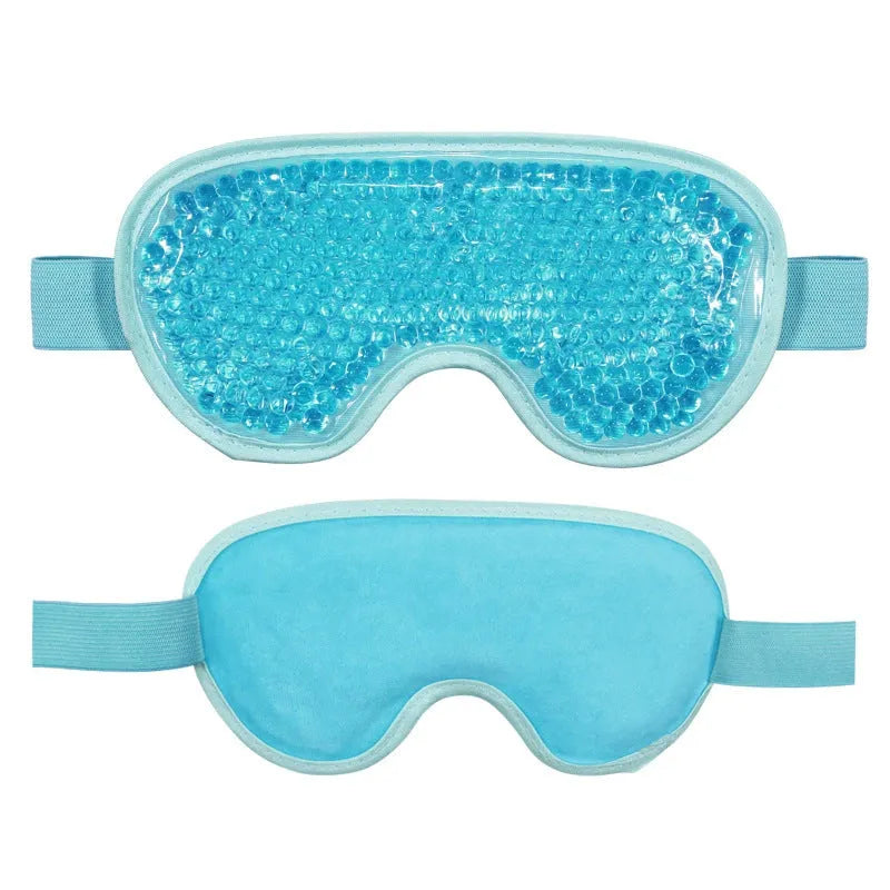 White rechargeable portable eye compress and atomisation cleaning device with eye mask.