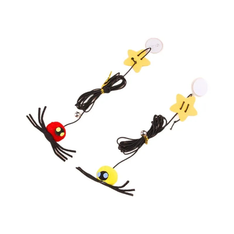 Hanging door cat toy with elastic rope, feather, bell, and spider attachment in red colour