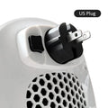 White ceramic heating electric blower heater with remote control on table