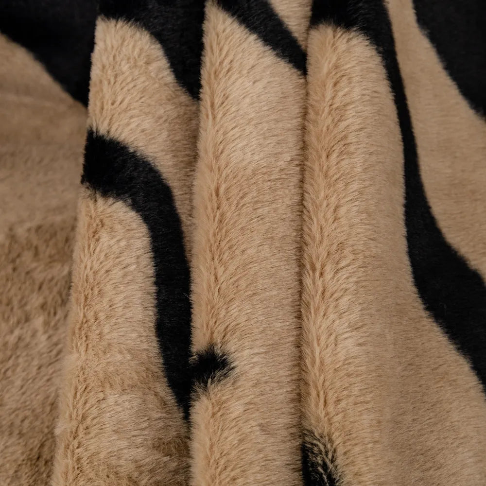 Zebra pattern flannel sofa slipcover in caramel colour showing non-slip underside and matching pillowcase